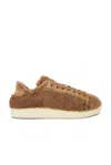 Valentino Vlogo Signature Shearling Sneaker In Brown