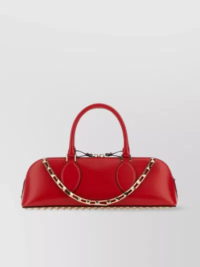 Valentino Garavani Duffle Rockstud Red Calf Leather Handbag In Rouge Pur