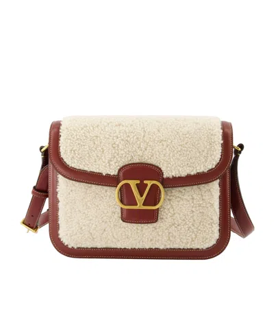 Valentino Garavani Shearling Leather Shoulder Bag In Brown