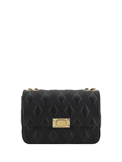 Valentino Garavani Borsa A Spalla Trapuntata Nera Con Catena Dorata In Black