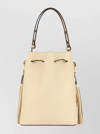 VALENTINO GARAVANI SIGNATURE BUCKET BAG WITH TASSEL AND HANDLE