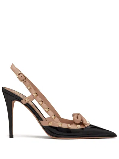 Valentino Garavani Rockstud 100 Bow-embellished Patent-leather Slingback Pumps In Black
