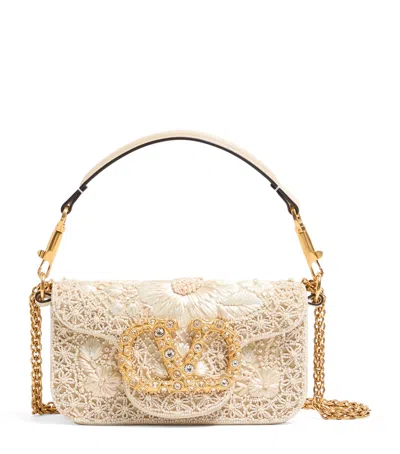 Valentino Garavani Small Embellished Locò Shoulder Bag In White