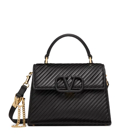 Valentino Garavani Vsling Leather Top Handle Bag In R82 Nero/rubin
