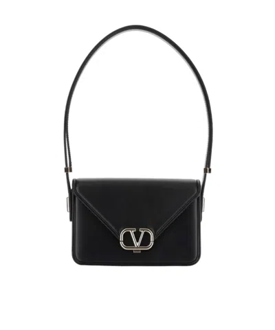 Valentino Garavani Small Letter Leather Shoulder Bag In Black