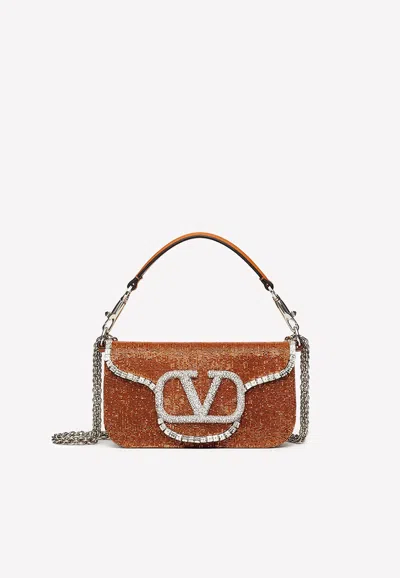Valentino Garavani Small Locò Vlogo Crystal Shoulder Bag In Orange