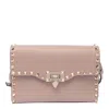 Shop Valentino Small Rockstud Crossbody Bag In Pink