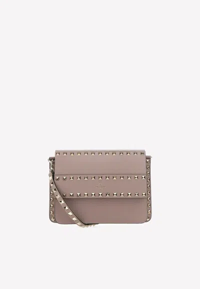 Valentino Garavani Small Rockstud Grained Leather Crossbody Bag In Blush
