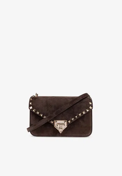 Valentino Garavani Small Rockstud Suede Shoulder Bag In Brown