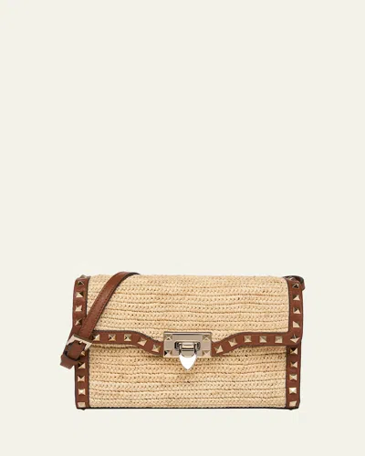 Valentino Garavani Small Rockstud-trim Viscose Raffia Crossbody Bag In Brown