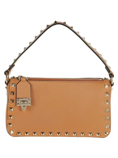 Valentino Garavani Valentino Rockstud Small Grainy Leather Crossbody In Beige
