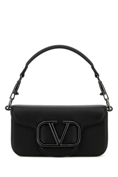 Valentino Garavani Handbags. In Black