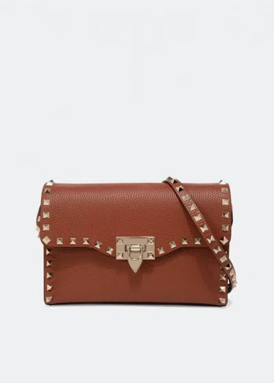 Valentino Garavani Rockstud Small Convertible Crossbody Bag In Brown