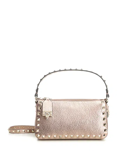 Valentino Garavani Valentino Rockstud Small Grainy Leather Crossbody In Pink