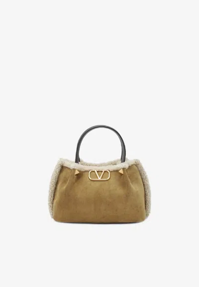 Valentino Garavani Small Vlogo Suede Top Handle Bag In Sand