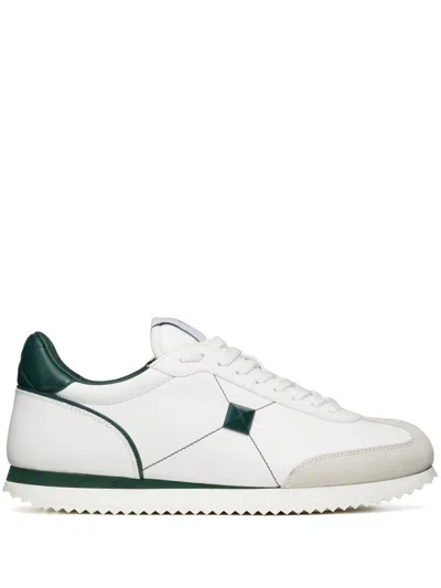 Valentino Garavani Quilted Leather Sneakers Featuring Stud Detailing In White English Green
