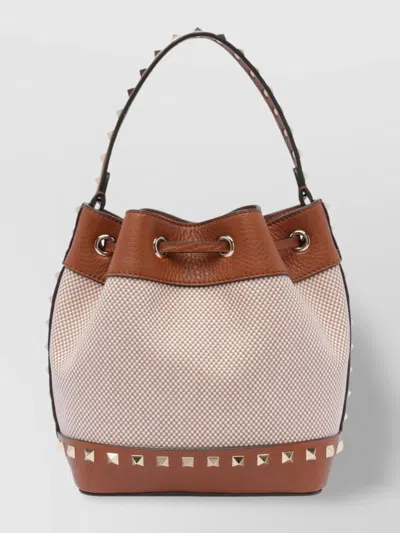 Valentino Garavani Studded Bucket Bag With Top Handle And Adjustable Strap