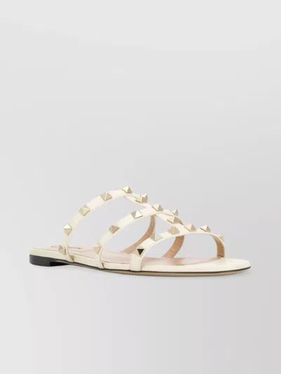 VALENTINO GARAVANI STUDDED LEATHER CAGE FLAT SANDALS