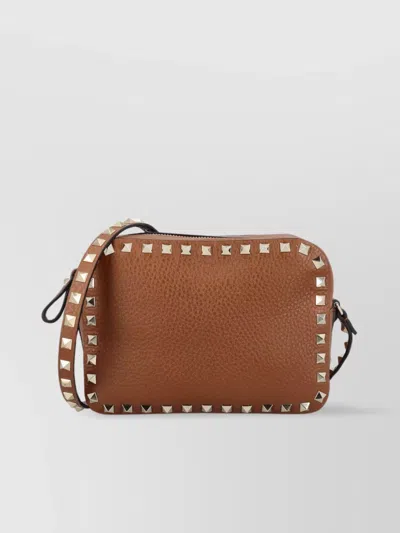 Valentino Garavani Studded Leather Crossbody Bag In Brown