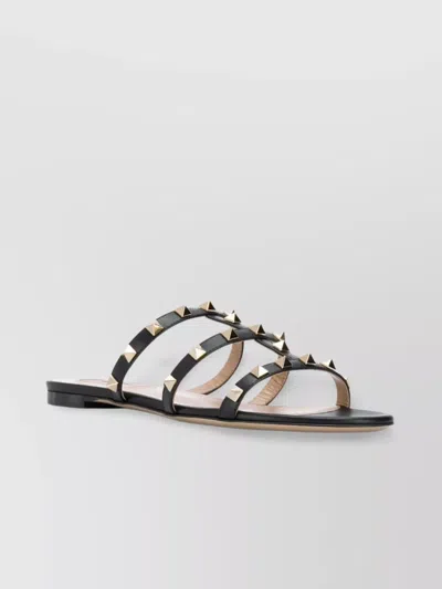 Valentino Garavani Studded Leather Flat Sandals In Black