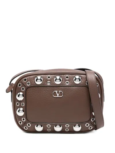 Valentino Garavani Studded Leather Messenger Bag In Brown