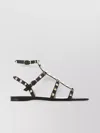 Valentino Garavani Rockstud Flat Calfskin Sandal With Straps Woman Black 41.5 In Grey