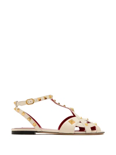 Valentino Garavani Flat Sandals Ankle Strap Open Toe Studs In Neutral