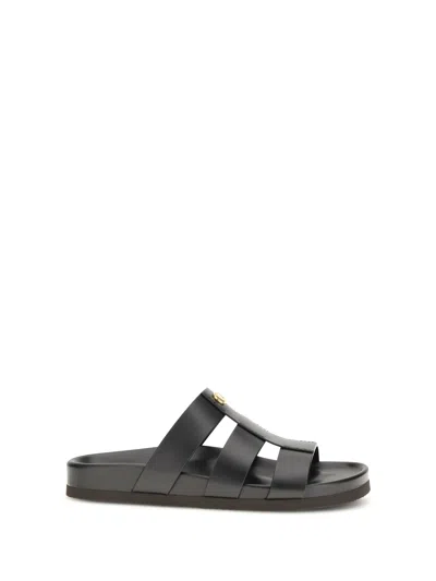 Valentino Garavani Studshield Logo-embellished Leather Sandals In Black
