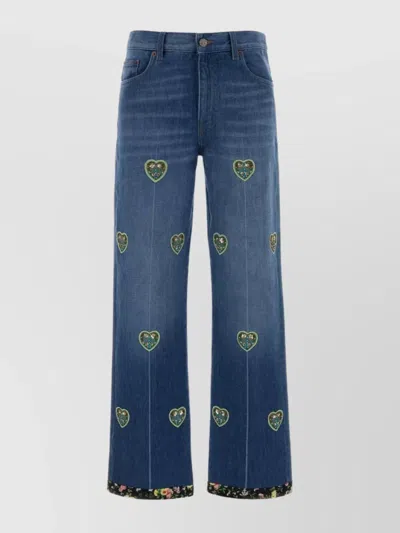 Valentino Stylish Denim Trousers Featuring Floral Cuffs In Blue