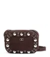 Valentino Garavani Dome-shaped Crossbody Bag With Metallic Eyelets And Adjustable Strap In Brown