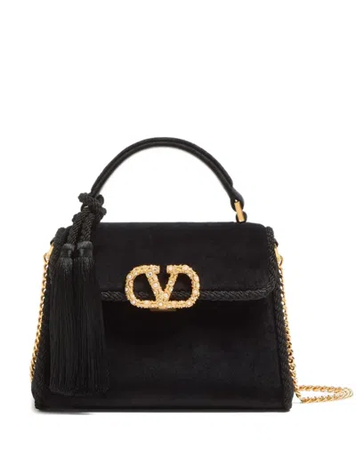 Valentino Garavani Tassel-embellished Suede Shoulder Bag In Black