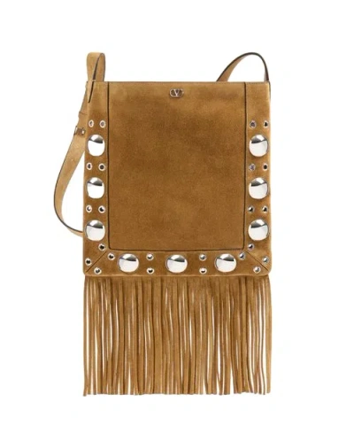 Valentino Garavani Tassel Suede Shoulder Bag In Beige