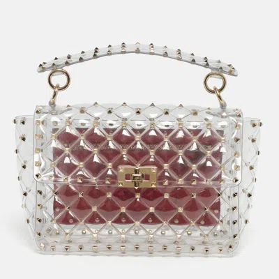 Pre-owned Valentino Garavani Transparent /red Pvc Medium Rockstud Spike Top Handle Bag