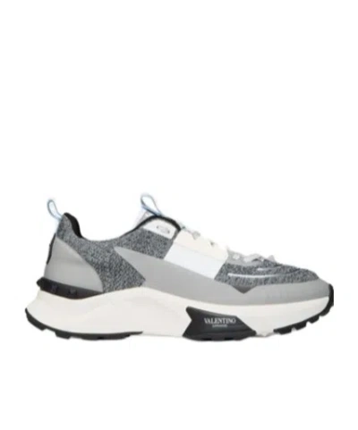 VALENTINO GARAVANI TRUE ACT LOW TOP TRAINER IN MESH AND RUBBERISED FABRIC