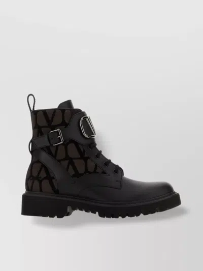 Valentino Garavani Two-tone Leather And Toile Iconographe Logo Combat Ankle Boots In Black