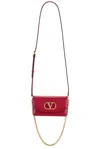 Valentino Garavani Vain Small Leather Clutch In Red