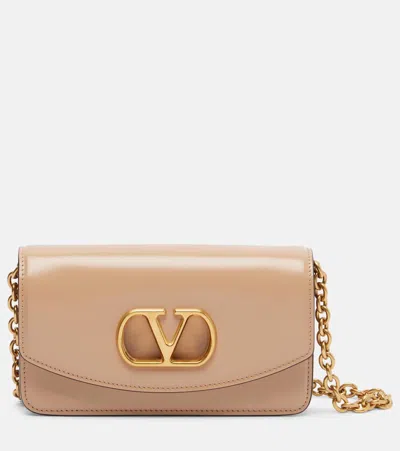 Valentino Garavani Vain Small Leather Clutch In Sand