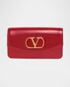 Valentino Garavani Vain Small Vlogo Leather Clutch Bag In Red