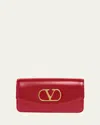 Valentino Garavani Vain Small Vlogo Leather Clutch Bag In Red