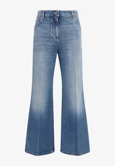 Valentino Vgold Flared-leg Faded Jeans In Blue