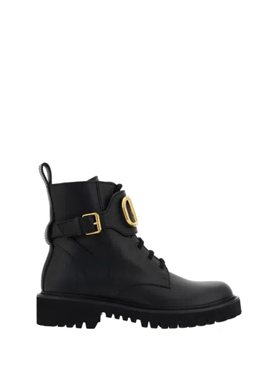 VALENTINO GARAVANI VLLGO SIGNATURE COMBAT BOOTS 