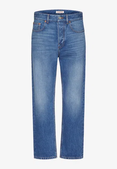 Valentino Vlogo Embossed Slim Jeans In Blue