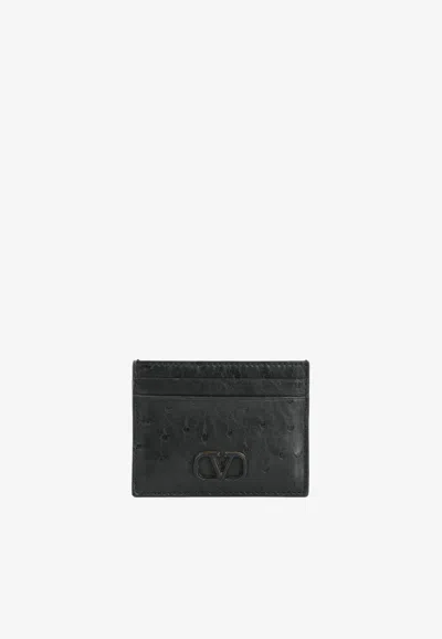 Valentino Garavani Vlogo Cardholder In Ostrich Leather In Black