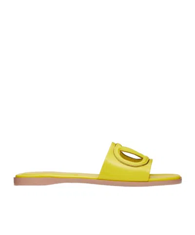 Valentino Garavani Vlogo Cut-out Leather Slides In Yellow