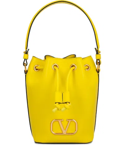 Valentino Garavani Vlogo Drawstring Bucket Bag In Yellow