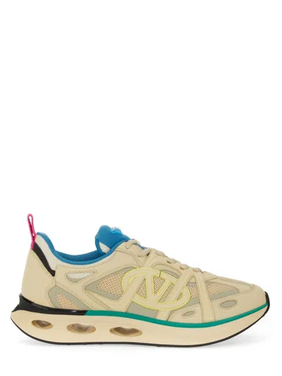 Valentino Garavani Vlogo Easyjog Low-top Sneaker In Calfskin And Fabric In Animal Print