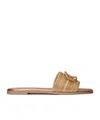Valentino Garavani Vlogo Signature Metallic Leather Slide Sandal With Cornely Embroidery Woman Gold  In Nude