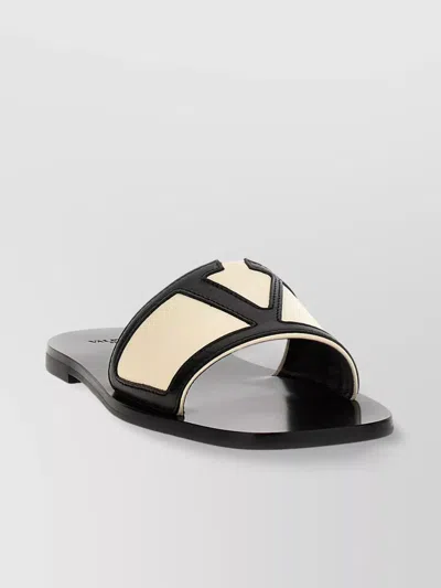 Valentino Garavani 'vlogo' Flat Sole Open Toe Sandals In Black
