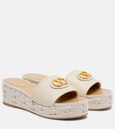 Valentino Garavani Vlogo Leather Platform Slides In Gold