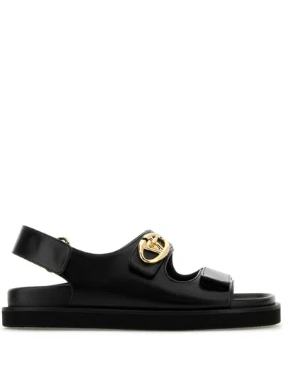 Valentino Garavani 'vlogo Locker' Flat Sandals With Gold-tone Hardware In Black